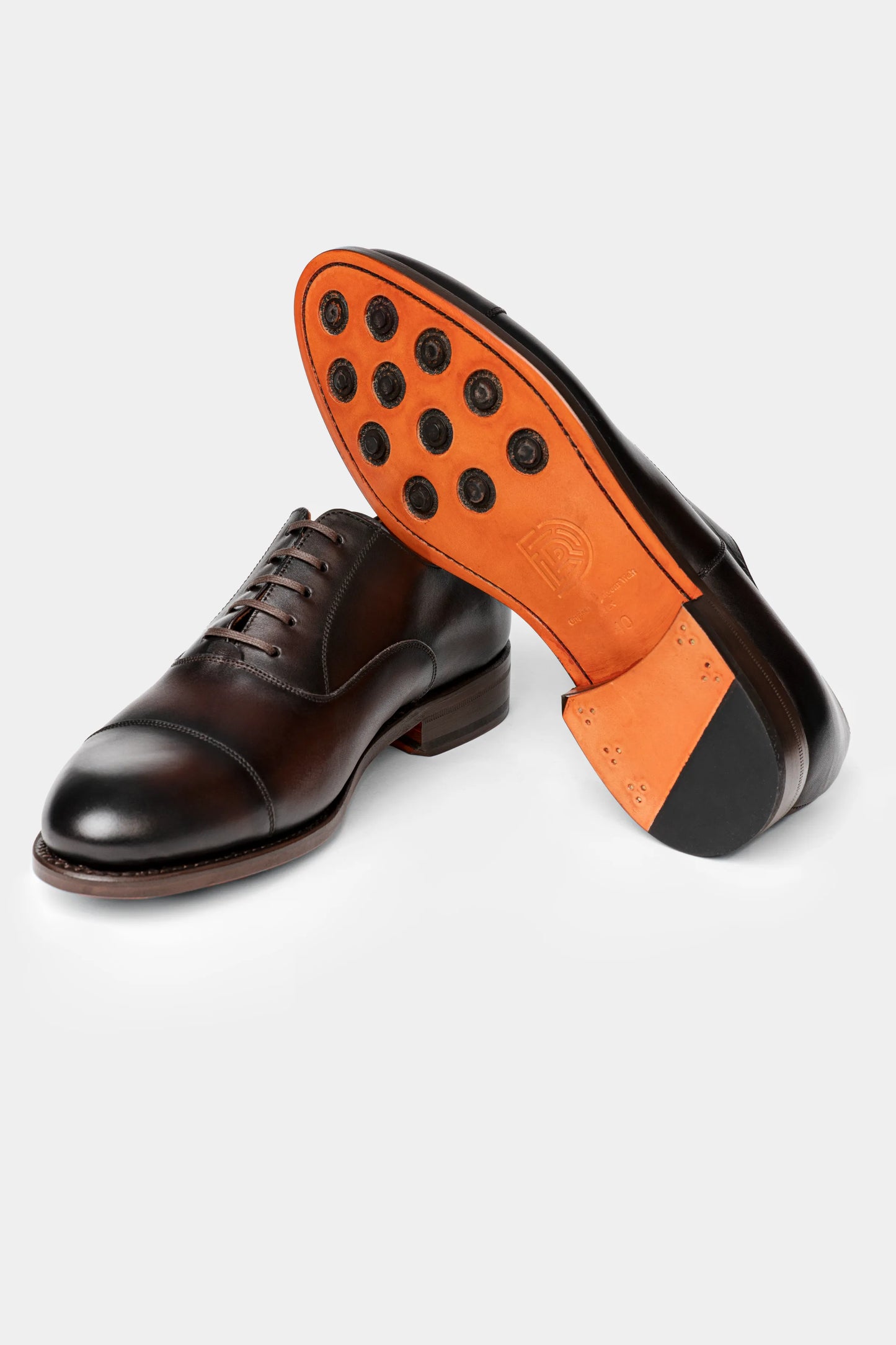 Pantofi Oxford maro închis piele Florentinodelure, talpă portocalie cu detalii.