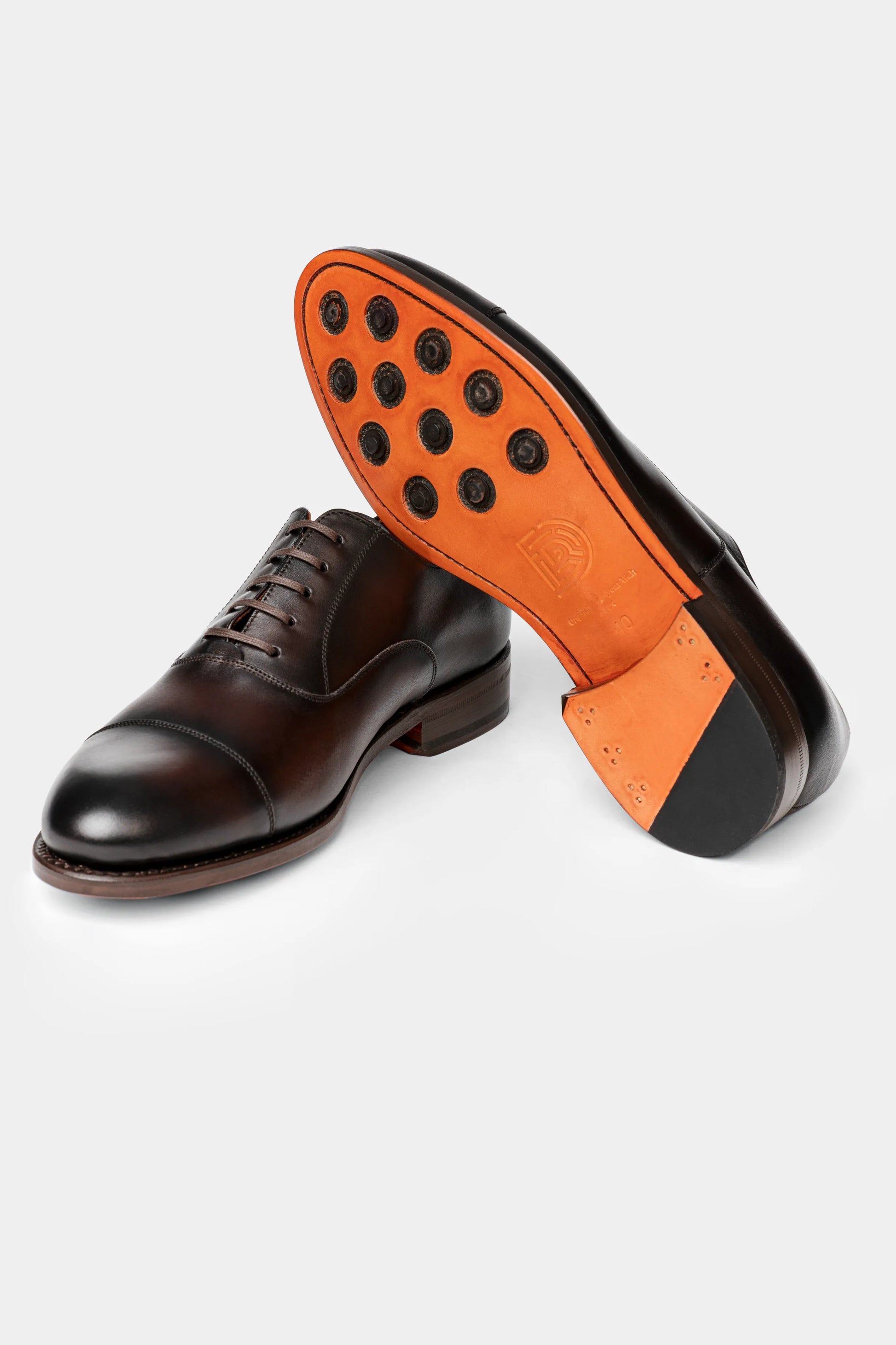 Pantofi Oxford maro închis piele Florentinodelure, talpă portocalie cu detalii.