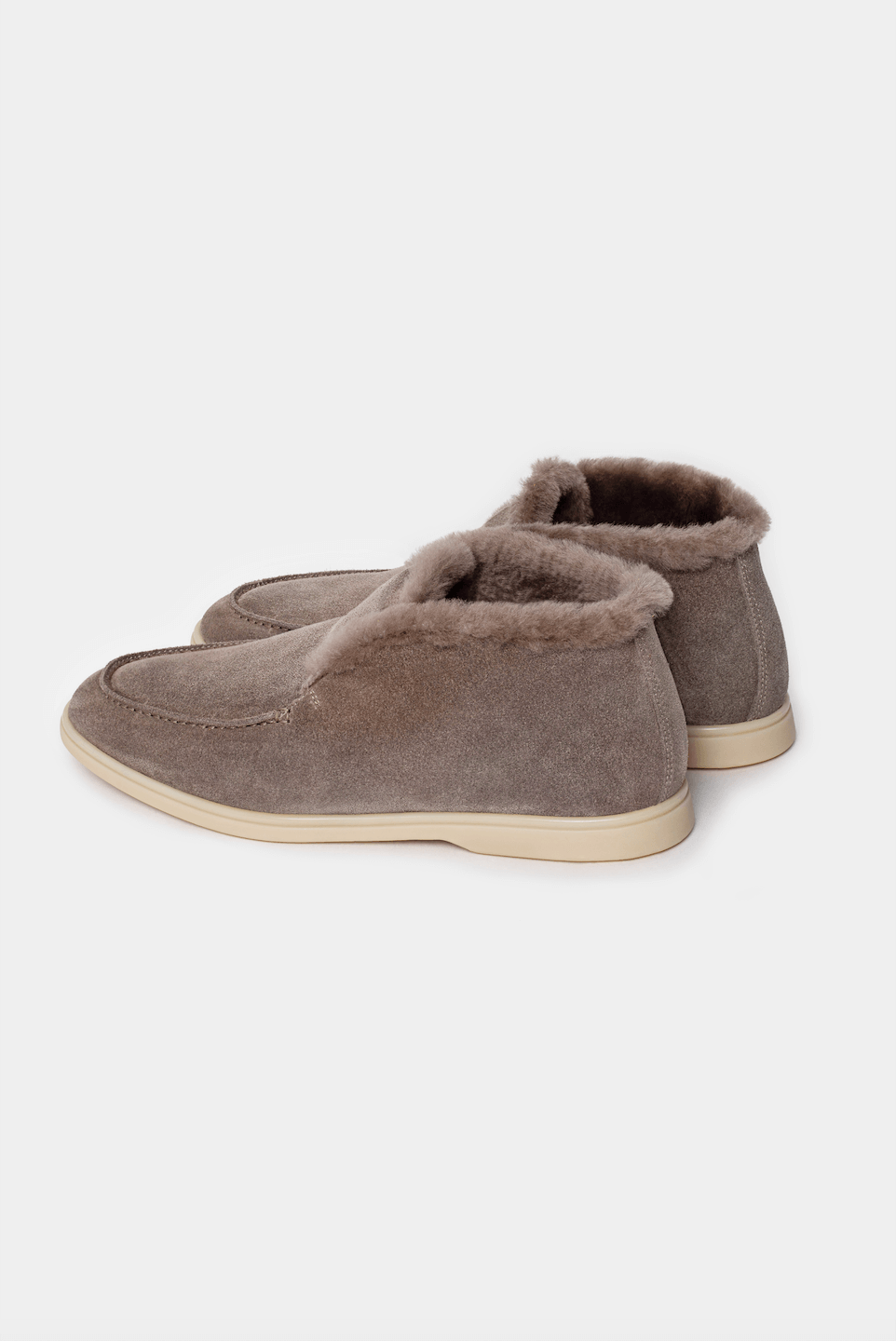 Botine din piele maro deschis cu blană, talpă crem, brand Florentinodelure, vedere laterală.