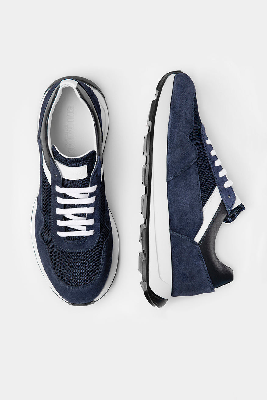 Adidași navy Florentinodelure, piele și velur, talpă cauciuc, detalii albe, stil atletic.