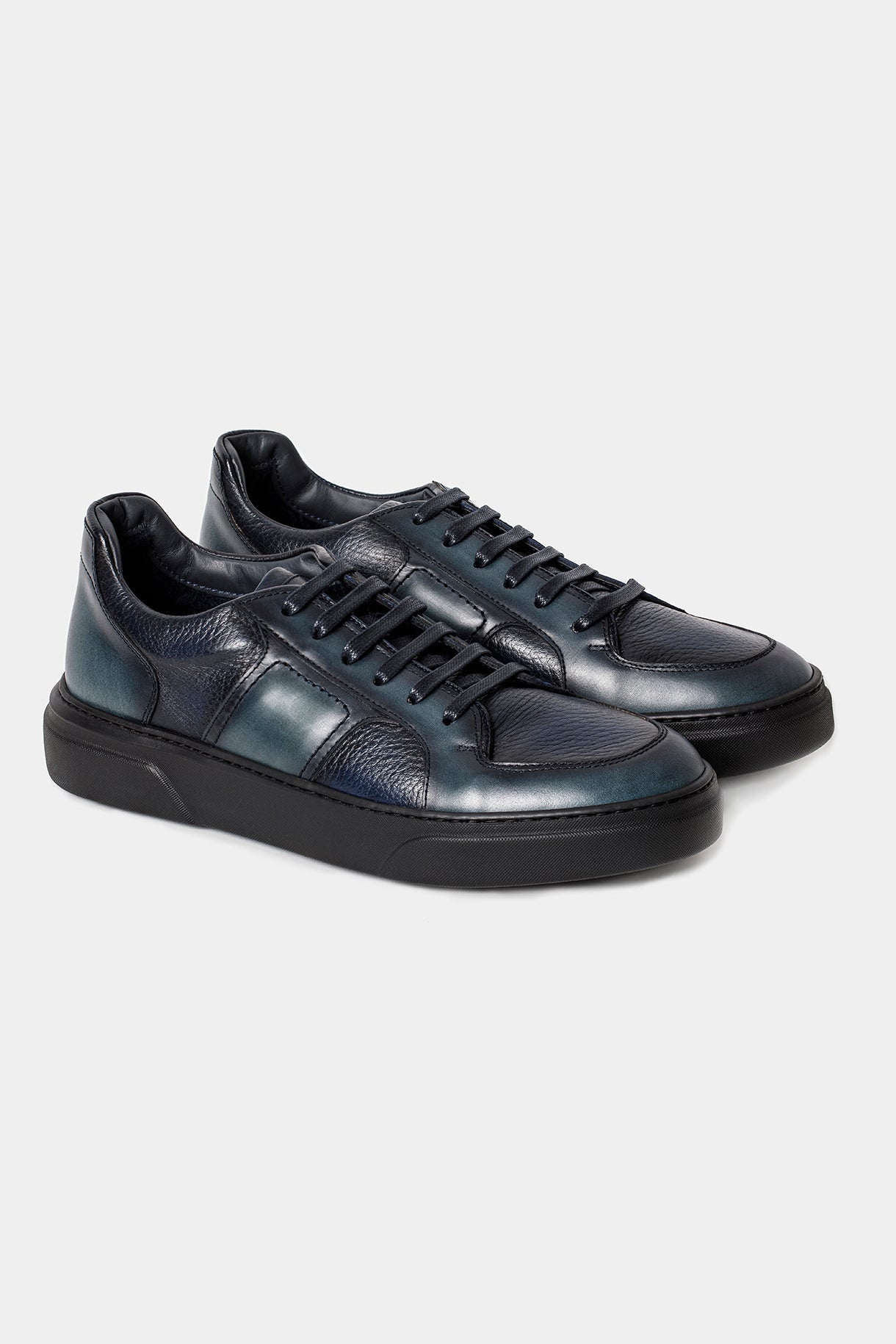 Sneakers Florentinodelure cu gradient navy-verde, talpă neagră, material texturat.