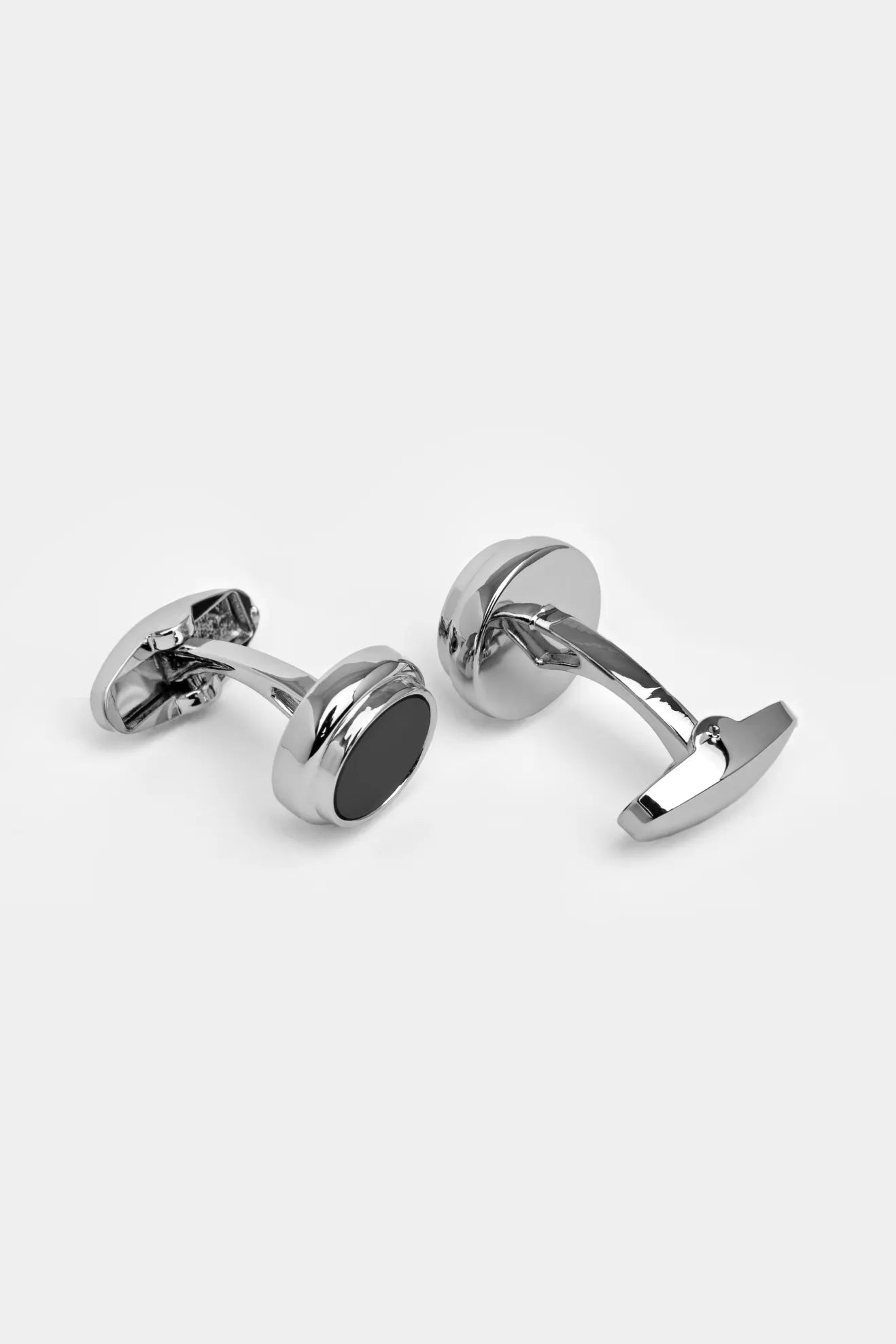 Butoni rotunzi negri metal lucios Florentinodelure, unghi lateral.