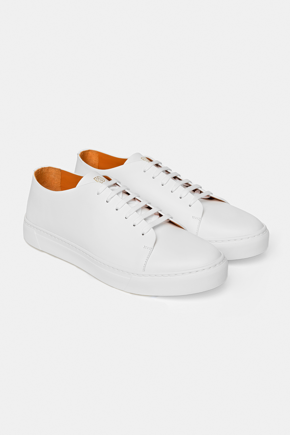 Sneakers albi Florentinodelure, piele, detaliu logo embosat pe limbă și călcâi.