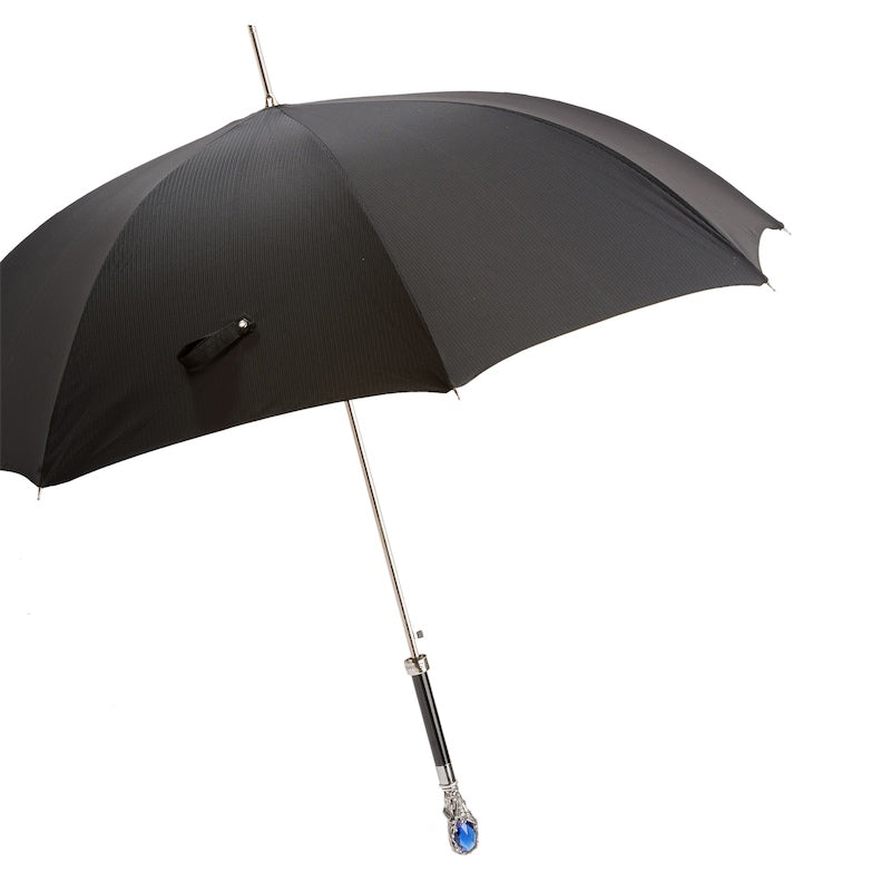 Umbrelă neagră Florentinodelure cu mâner decorat cu piatră albastră și ax metalic argintiu.