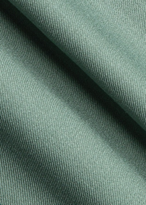 Textură material costum Florentinodelure verde Luna, detaliu.