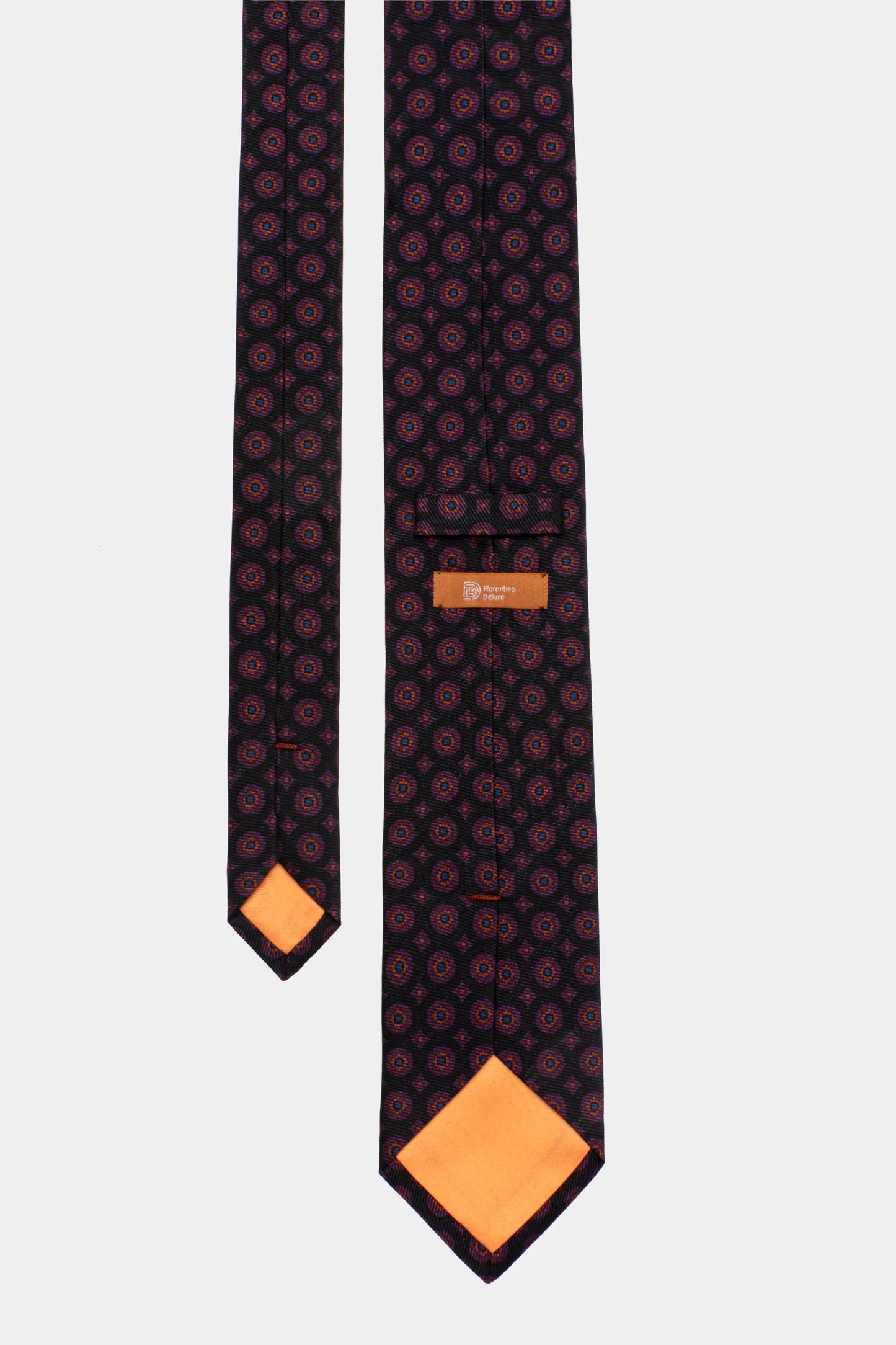 Cravată print mov Florentinodelure, design geometric, căptușeală portocalie.
