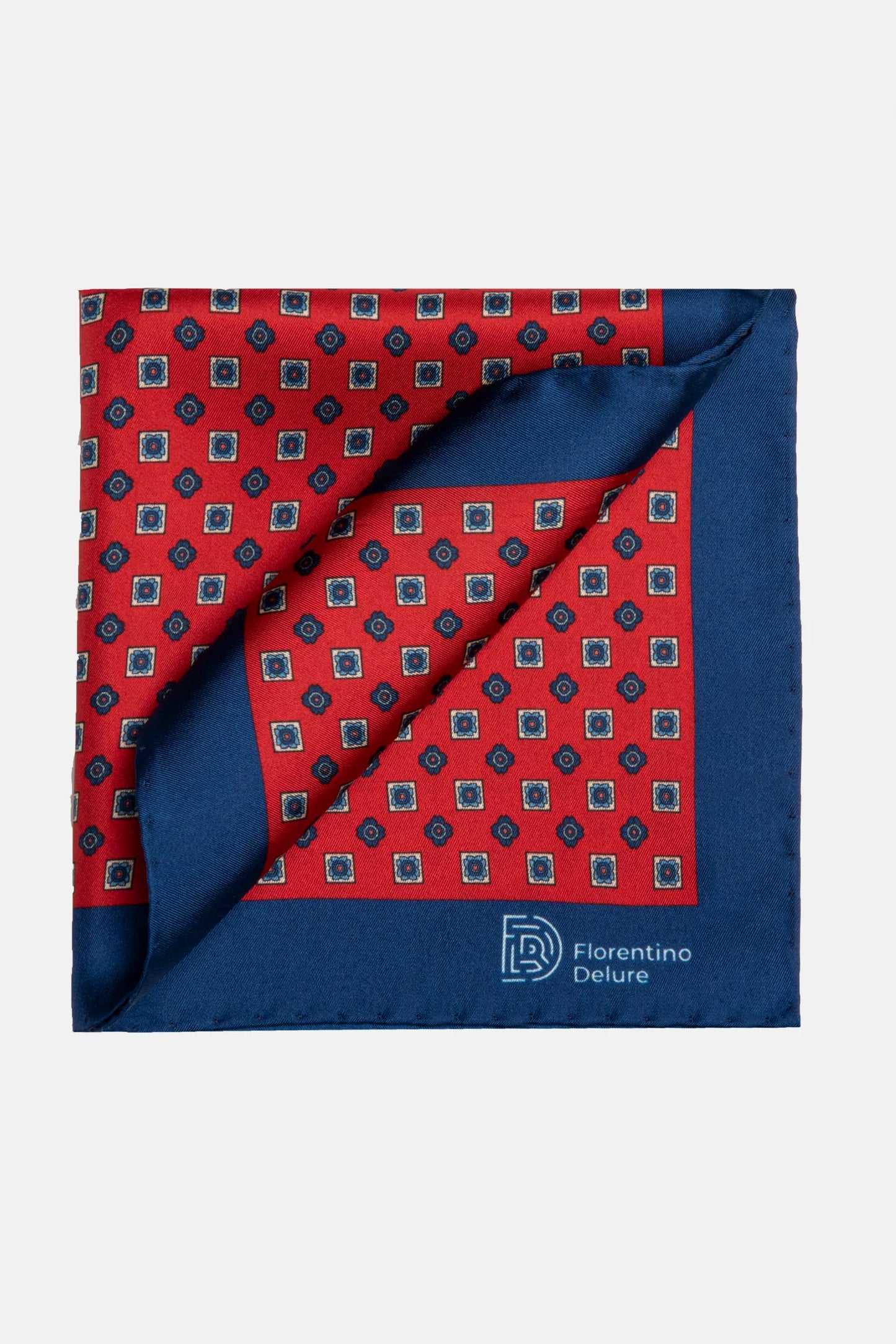 Batistă de buzunar Florentinodelure, roșu cu margine albastră și model geometric.
